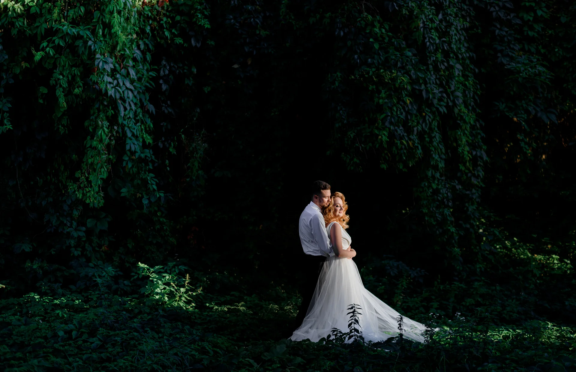 Newly married couple celebrating at their wedding